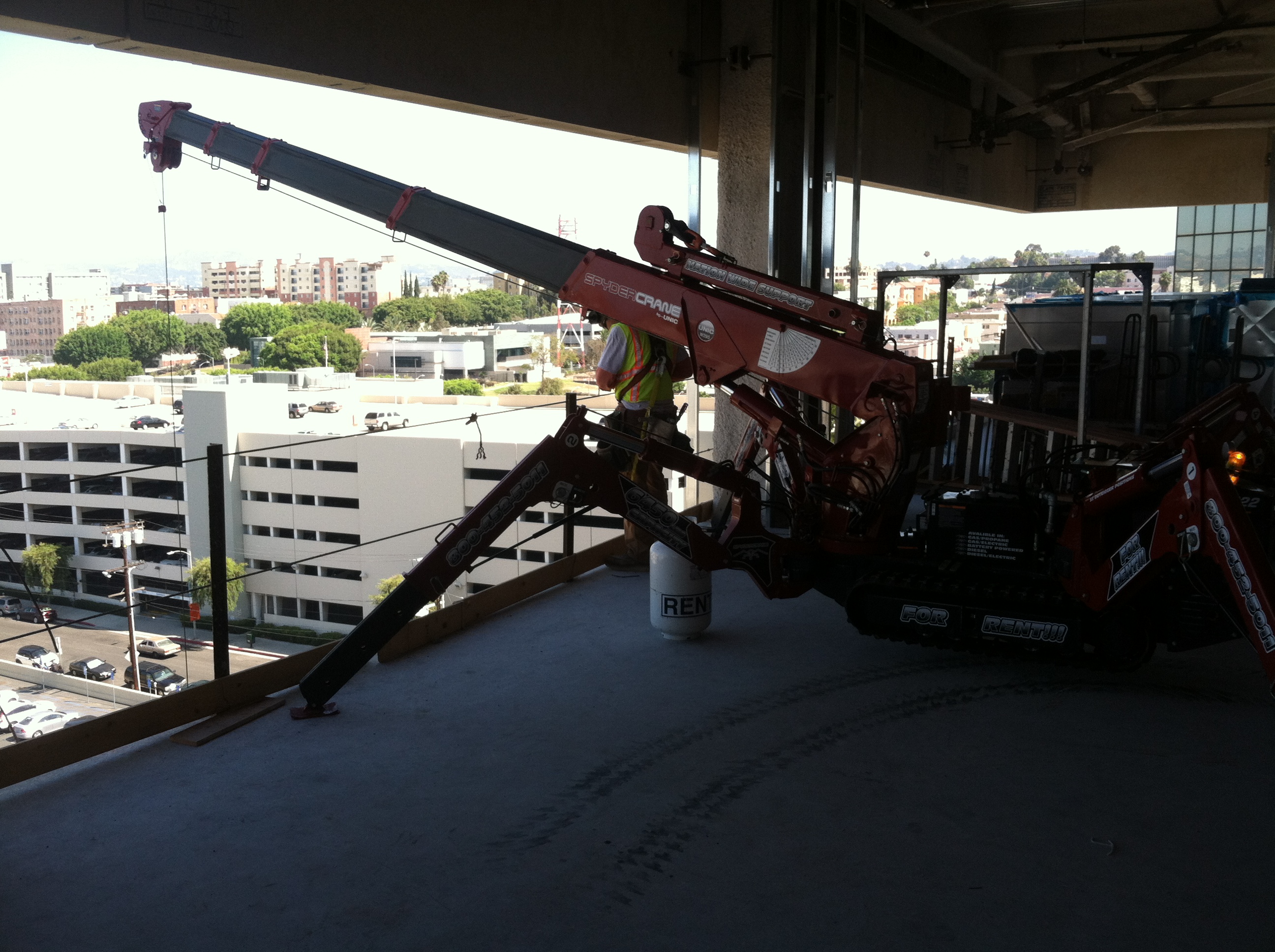 SPYDERCRANE mini crawler crane on a jobsite near Gardena