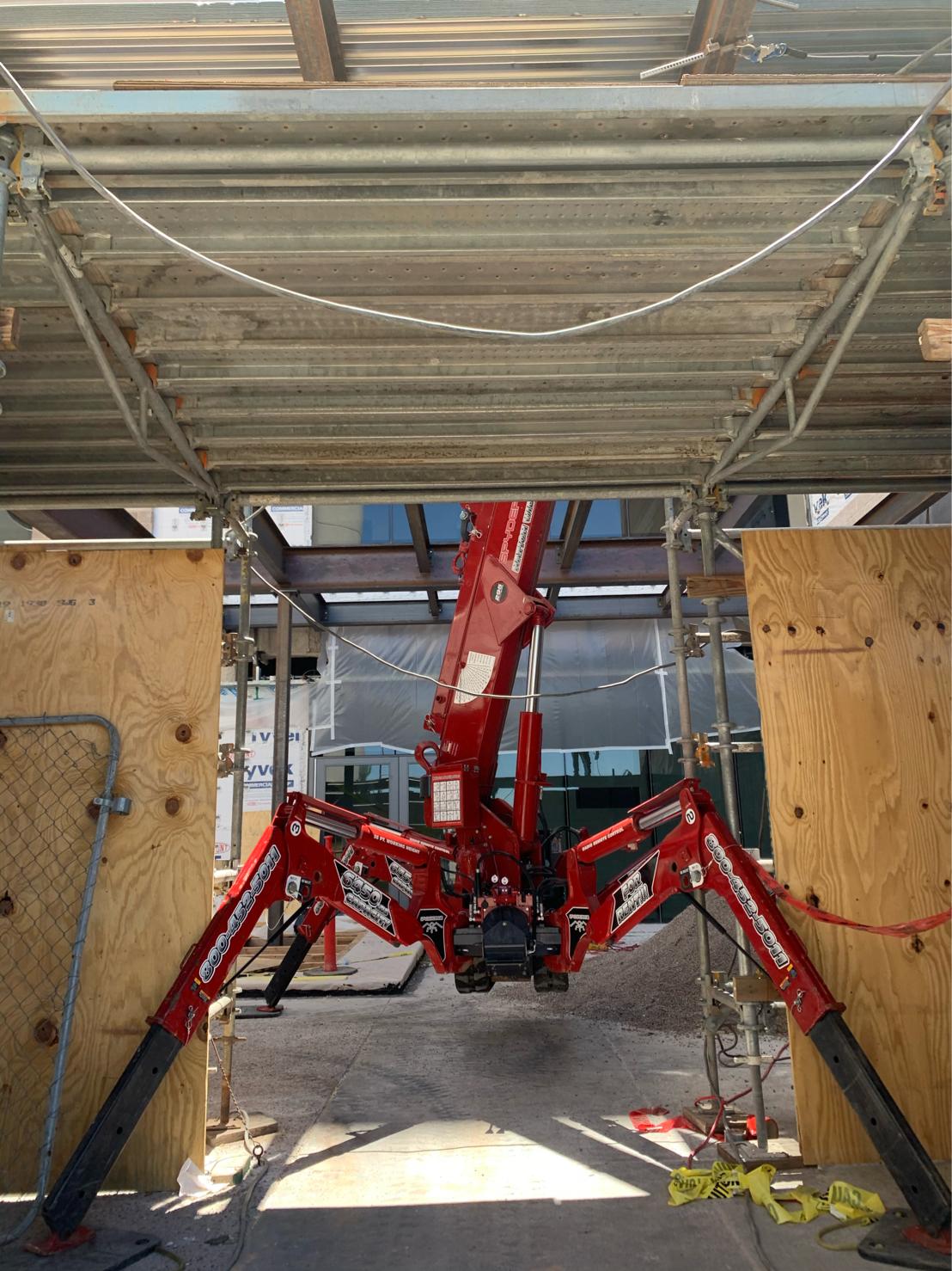 SPYDERCRANE mini crawler crane on a jobsite near Greenwood