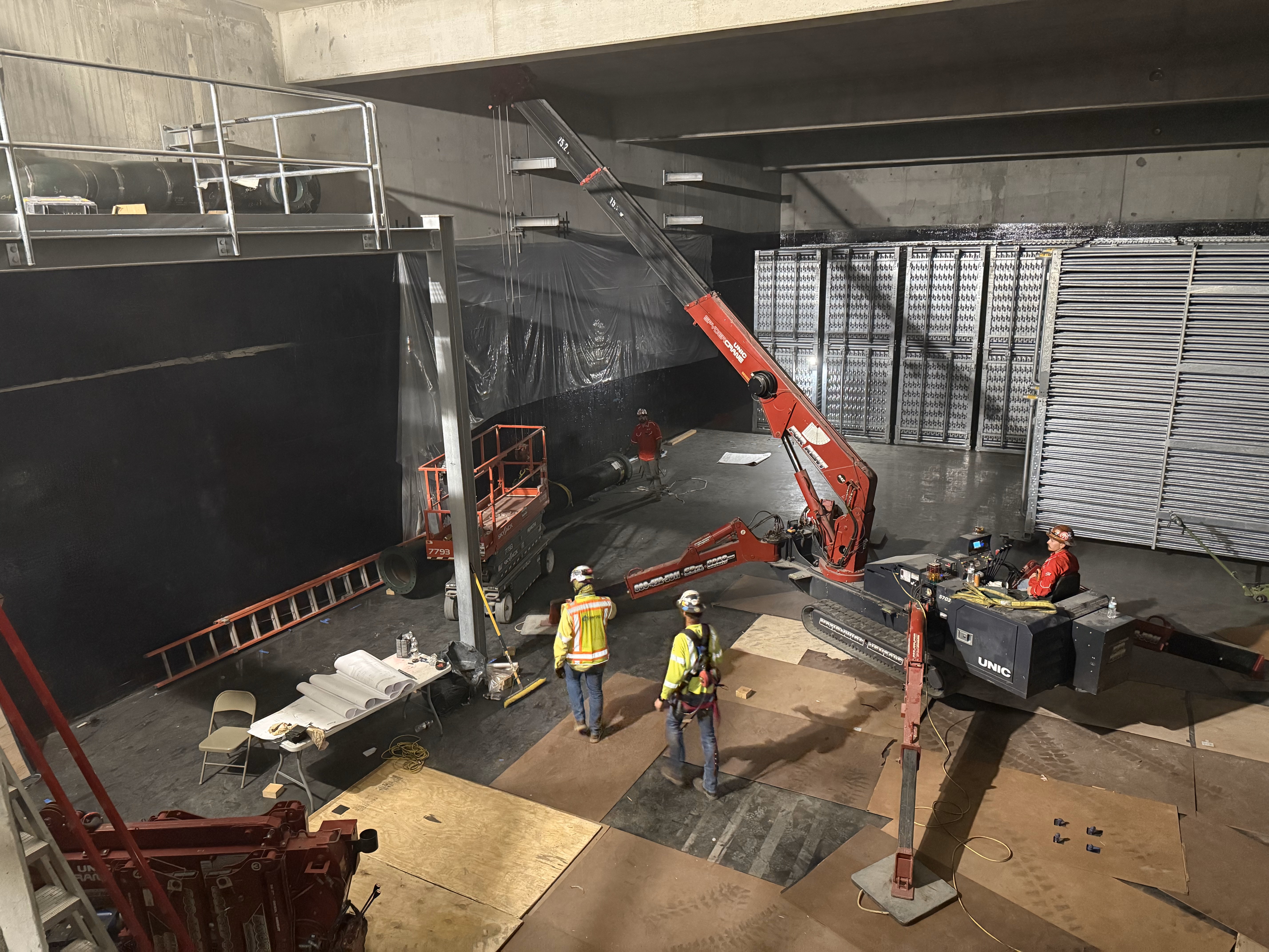 SPYDERCRANE mini crawler crane on a jobsite