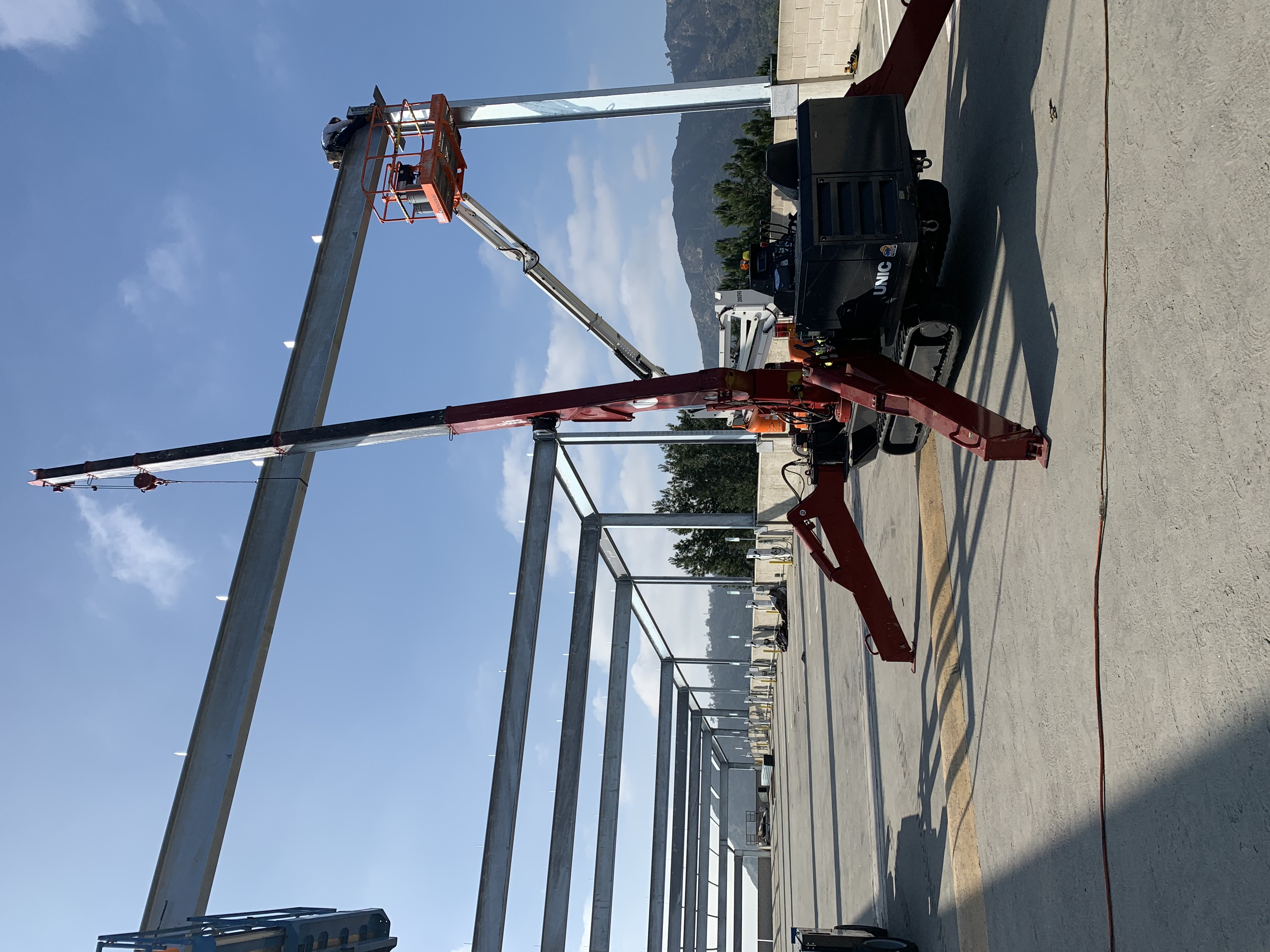 SPYDERCRANE mini crawler crane on a jobsite