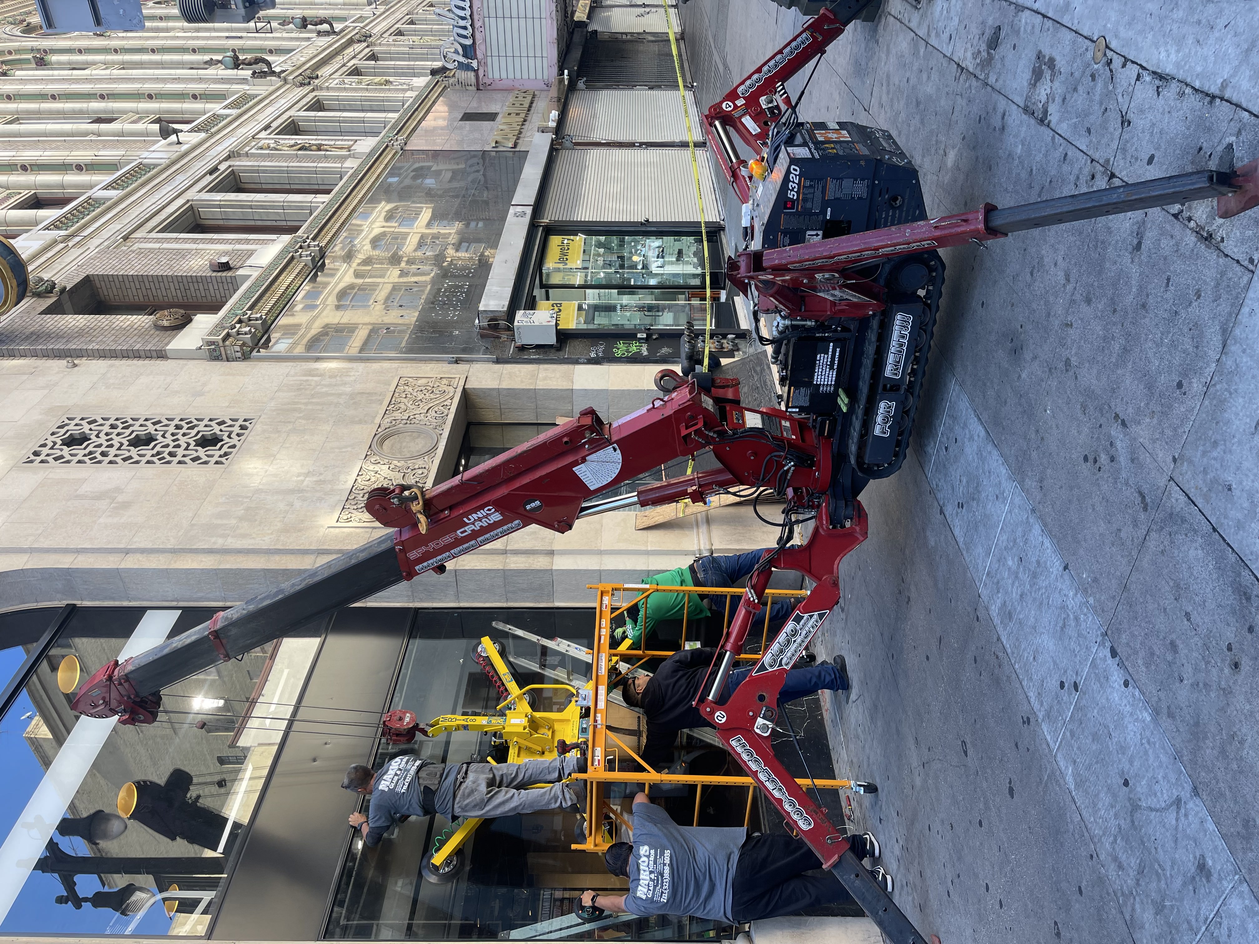 SPYDERCRANE mini crawler crane on a jobsite