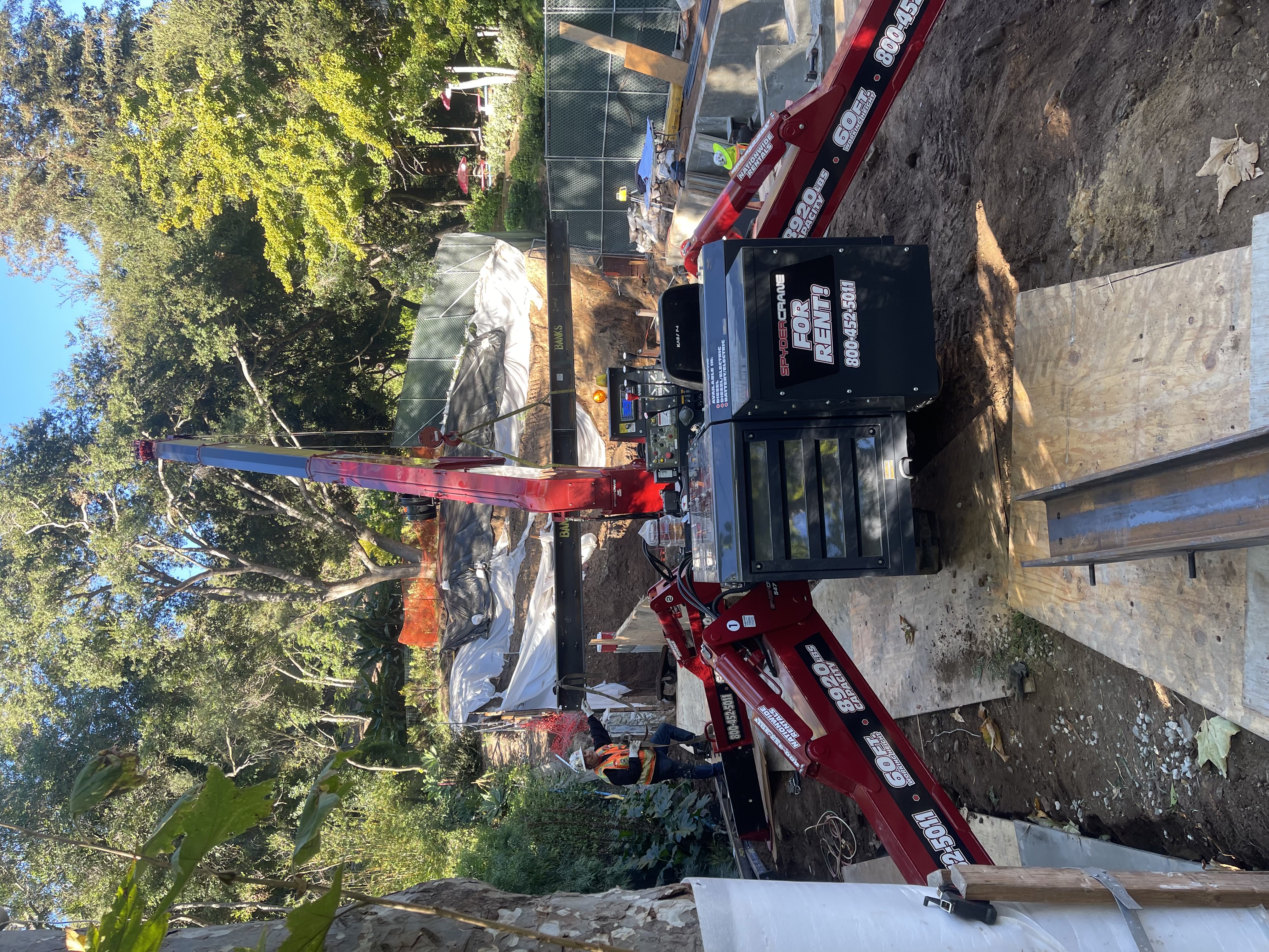 SPYDERCRANE mini crawler crane on a jobsite