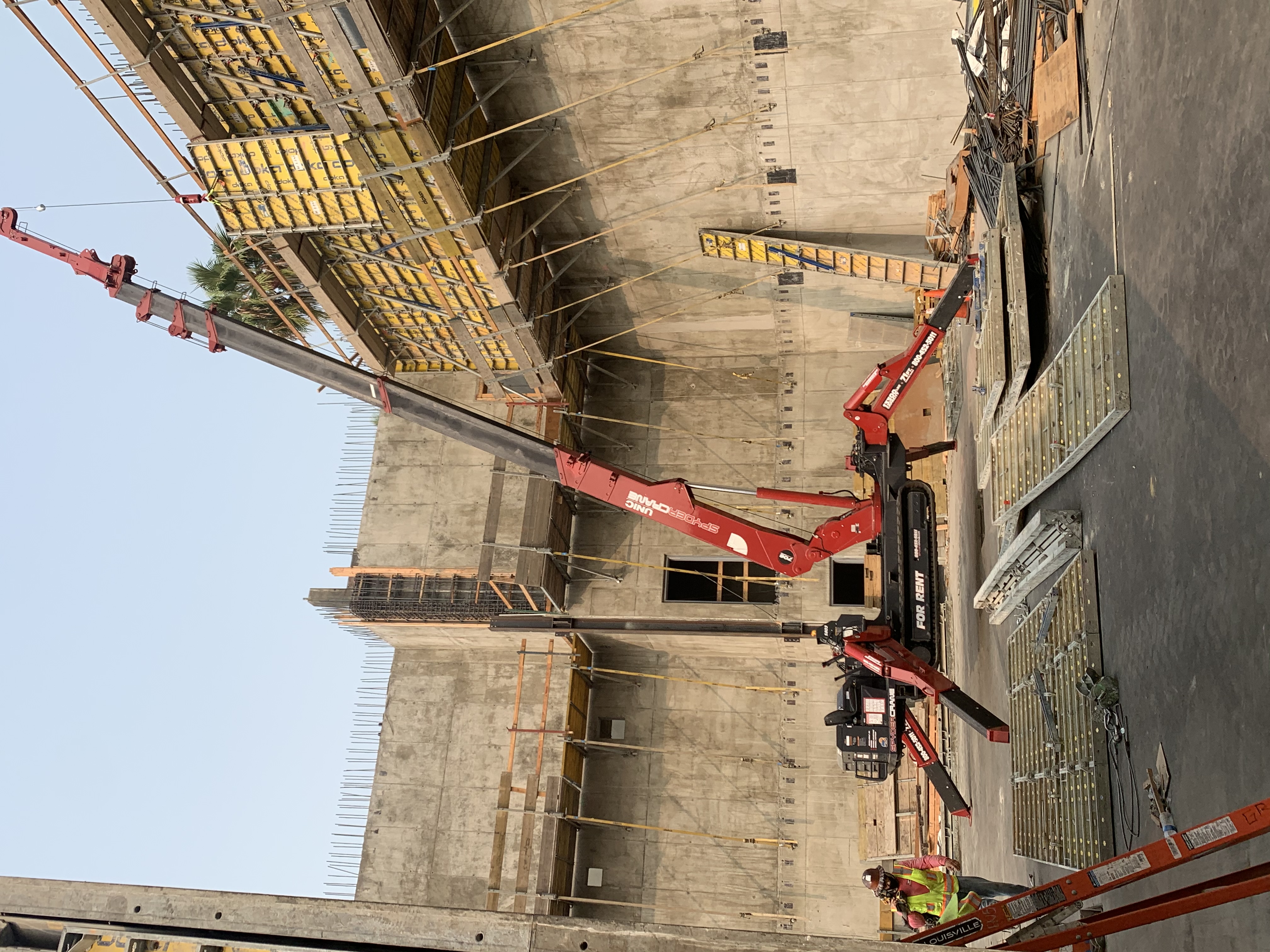 SPYDERCRANE mini crawler crane on a jobsite
