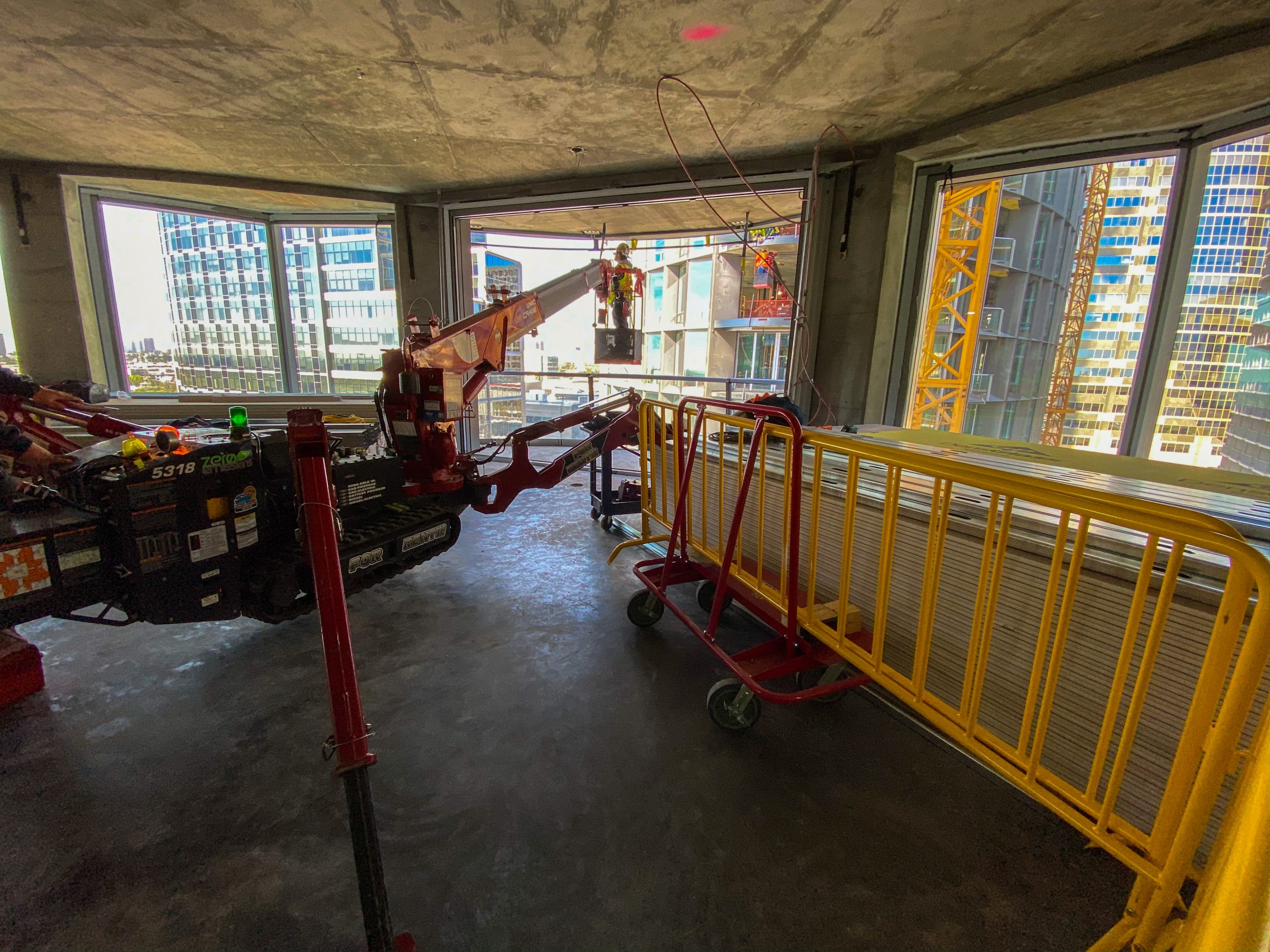 SPYDERCRANE URW506 mini crane on jobsite