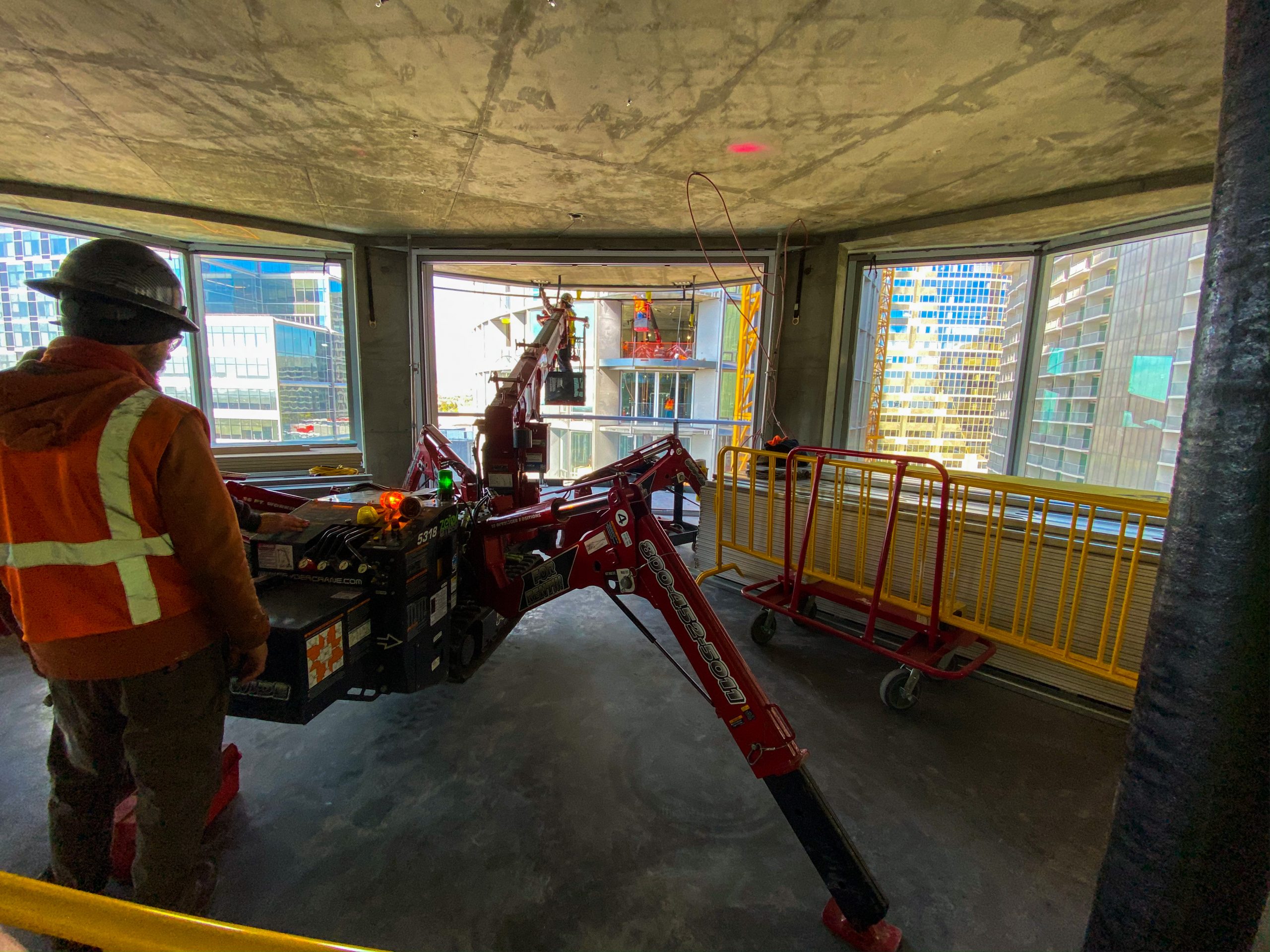 SPYDERCRANE URW547 mini crane on jobsite