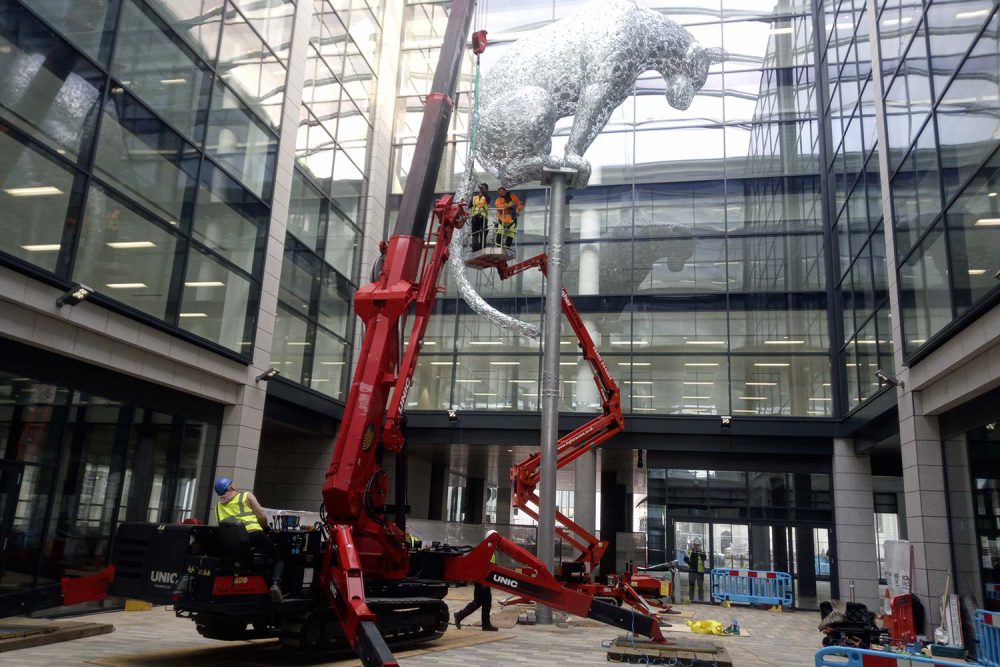 SPYDERCRANE URW1006 mini crane on jobsite